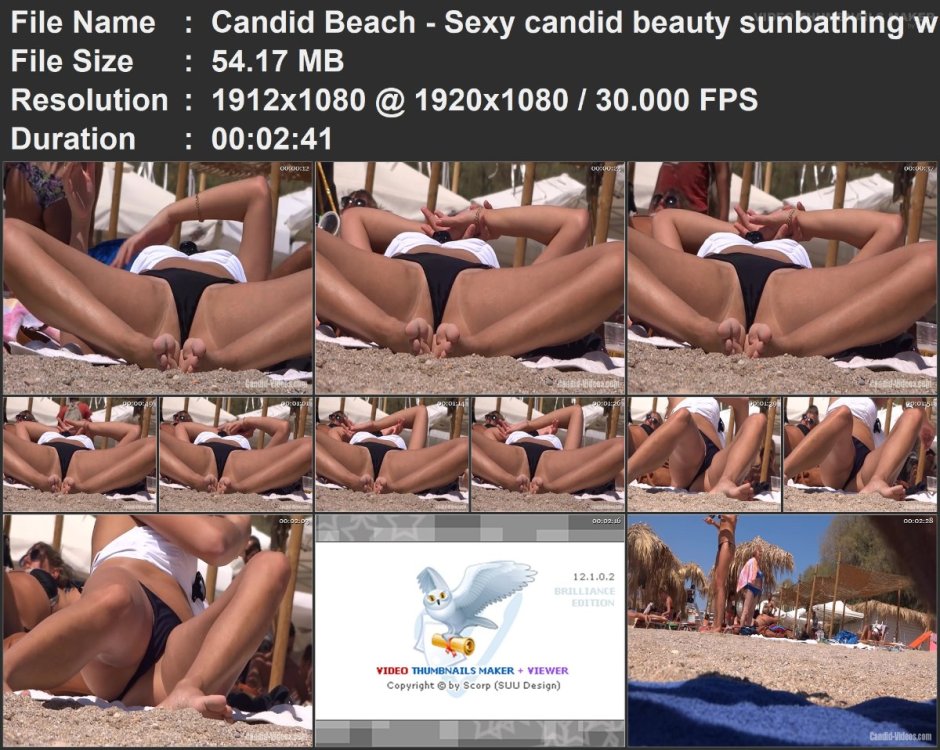 Candid Beach - Sexy candid beauty sunbathing with wide legs .mp4.jpg