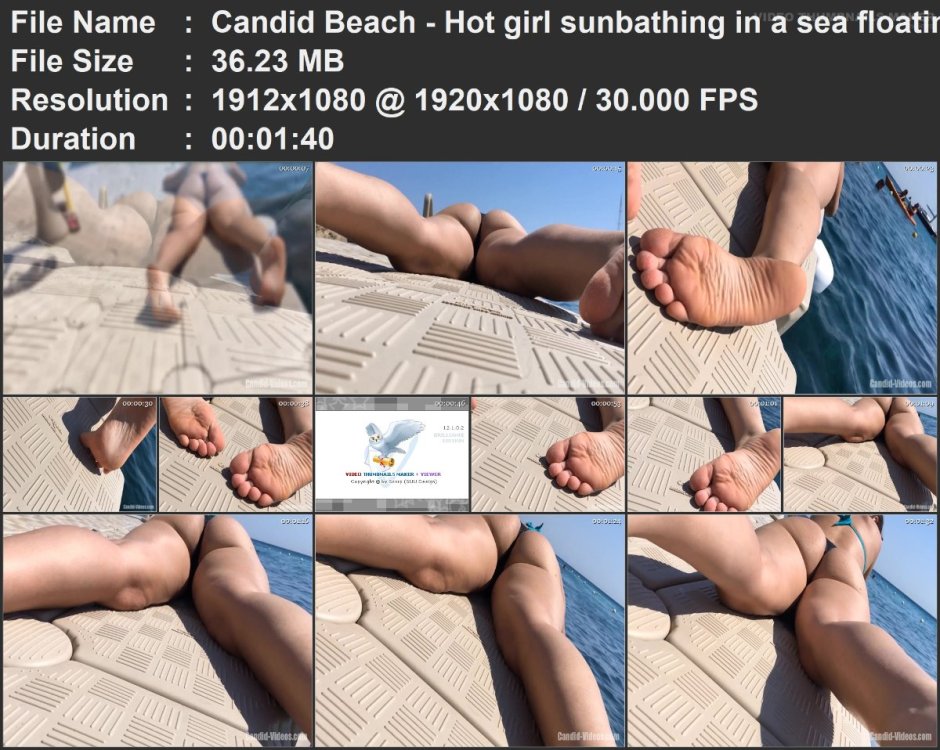 Candid Beach - Hot girl sunbathing in a sea floating platfor.mp4.jpg